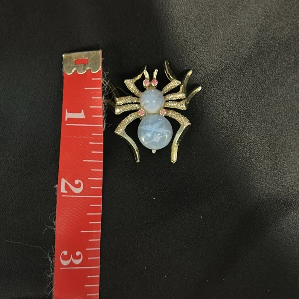 Elegant Gold and Blue Spider Brooch